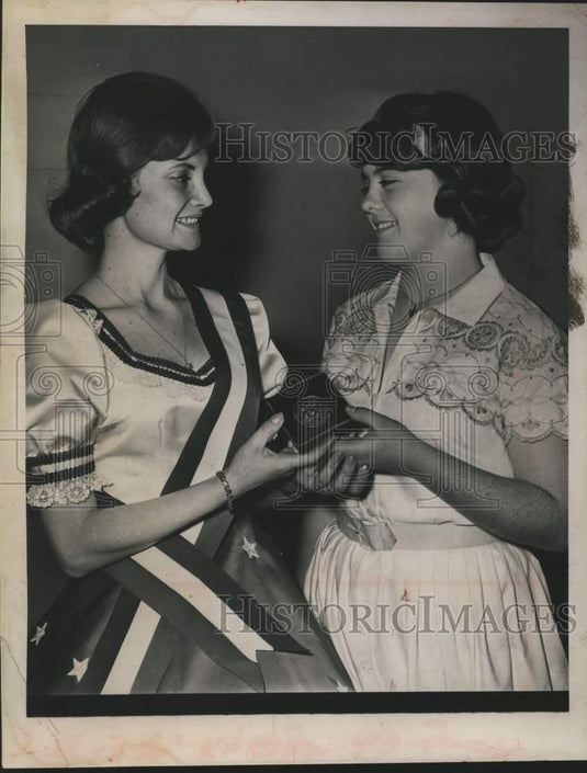 1963 Joan Sherman gives award to Sharon Lynch in Albany, New York - Historic Images