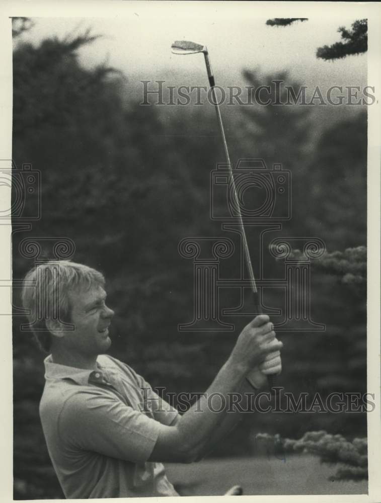 Press Photo Golfer John Taylor watches his ball after hitting iron shot- Historic Images