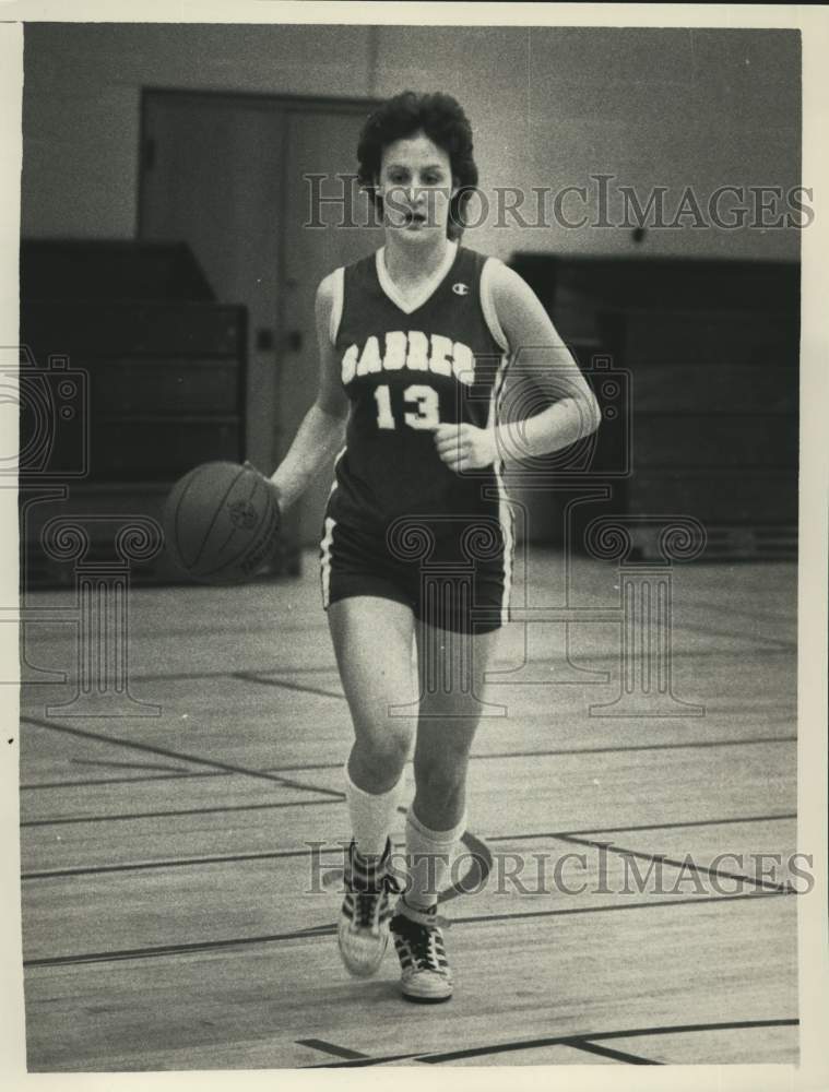 Schalmont HS in NY basketball player Val Higgins dribbles the ball - Historic Images