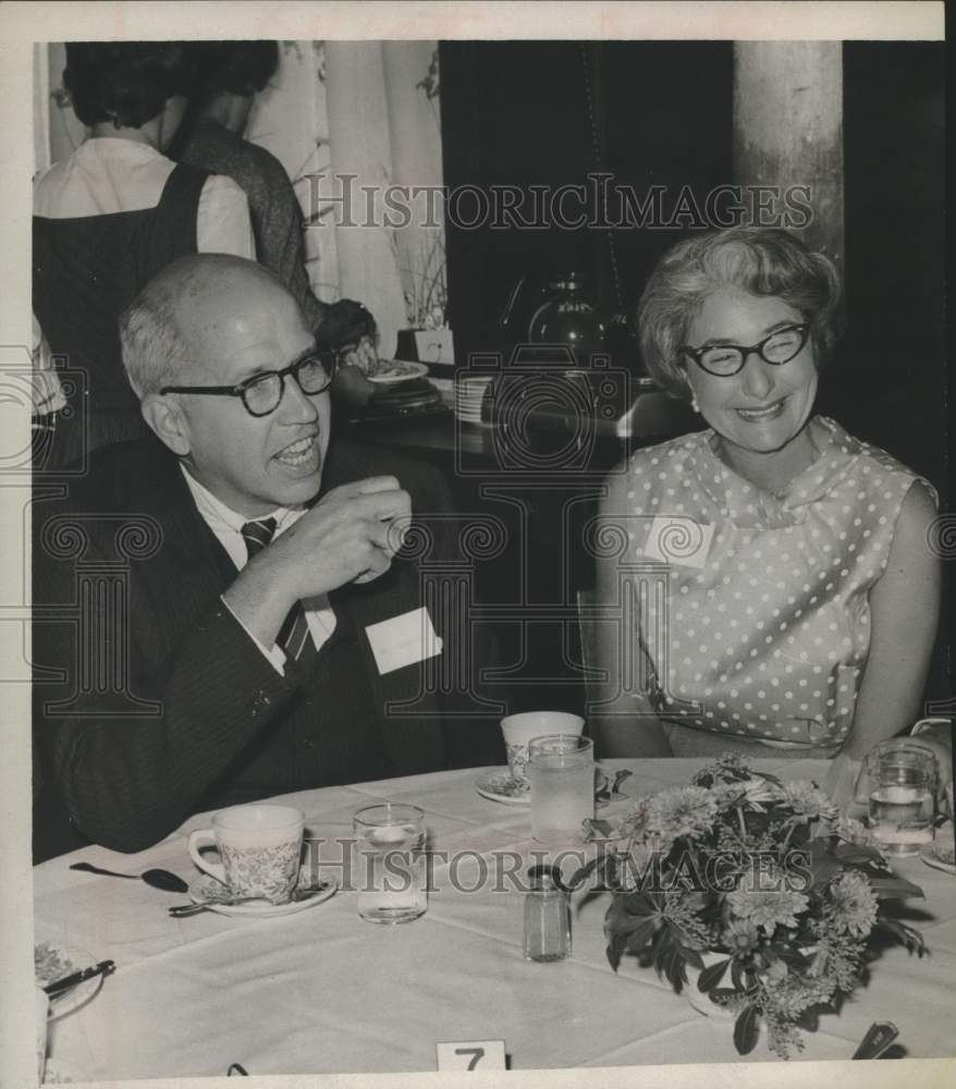 1963 Thomas C Mendenhall & Mrs Joseph Mintzer sit together at event - Historic Images