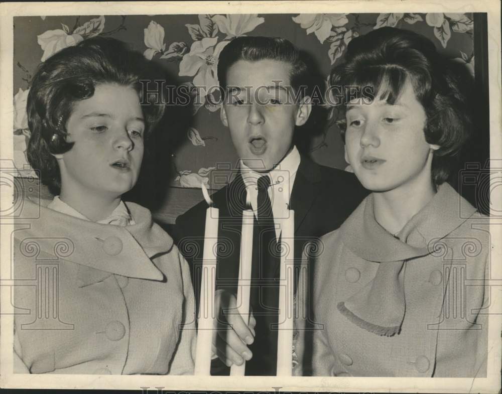 1962 The Paul Lyman triplets blow out candles on their 16th birthday - Historic Images