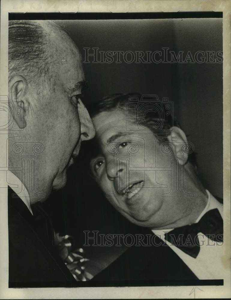 John P Lomenzo, New York Secretary of State, talks to John Mitchell - Historic Images