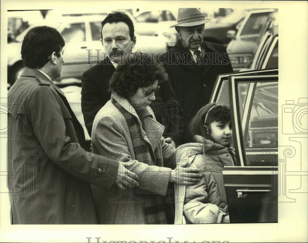 1988 The Lonczak family leaves Speigletown, NY church after funeral - Historic Images