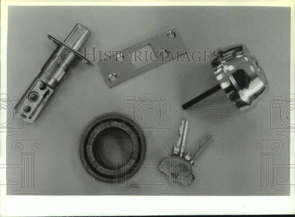 1993 Disassembled deadbolt door lock in Albany, New York - Historic Images