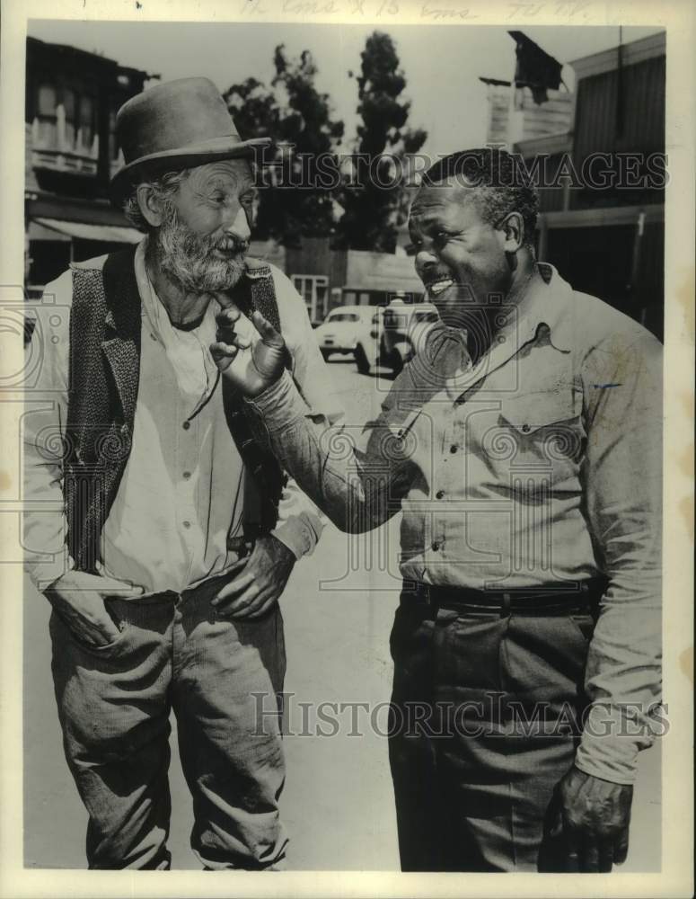 1963 Press Photo Professional Boxer Archie Moore with cowboy character, New York - Historic Images