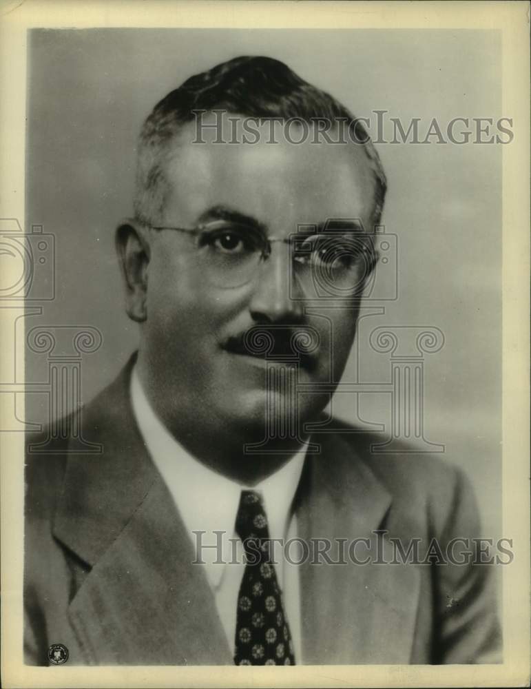 1945 Press Photo  Frank C Moore, New York State Comptroller, sits for portrait - Historic Images