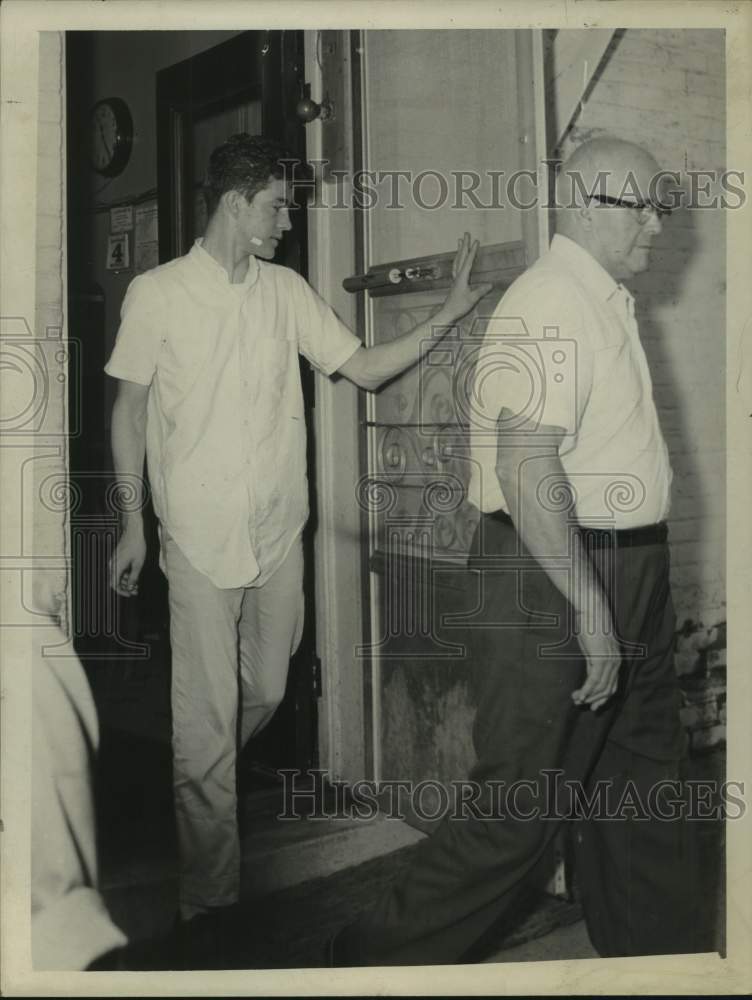 1961 Press Photo Edward Leonard follows his father out of Albany, NY office - Historic Images