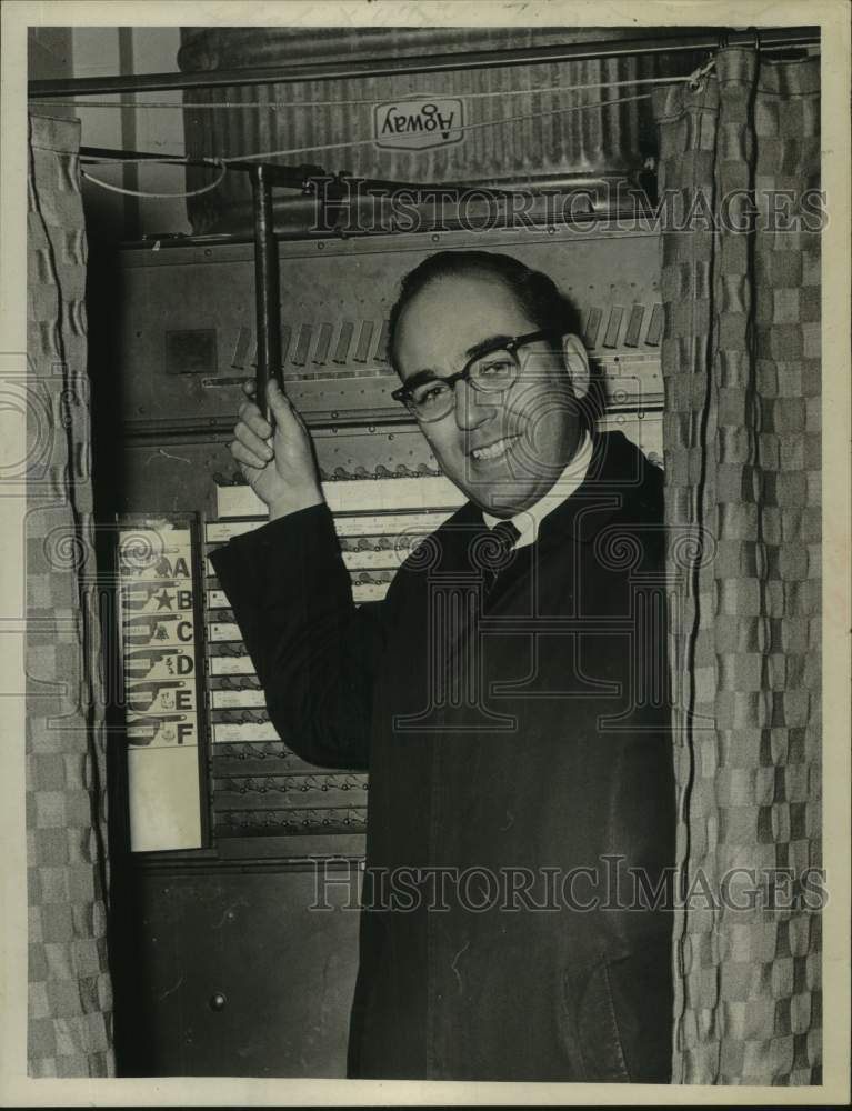 1966 Kenneth MacAffer Jr. in voting booth at Menands, NY fire house-Historic Images