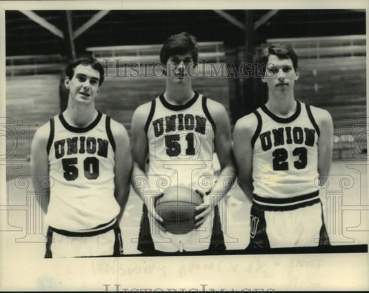 Press Photo  Union College Basketball players #50, #51, and #24 pose for photo