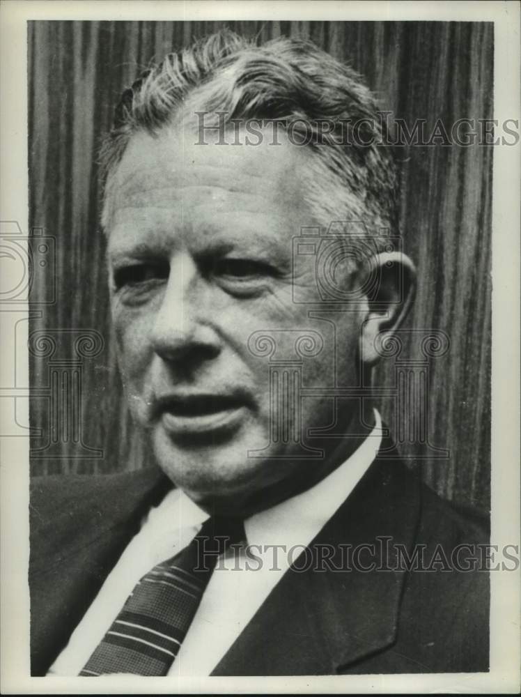 1957 Secretary of Defense Neil H McElroy listens during meeting - Historic Images