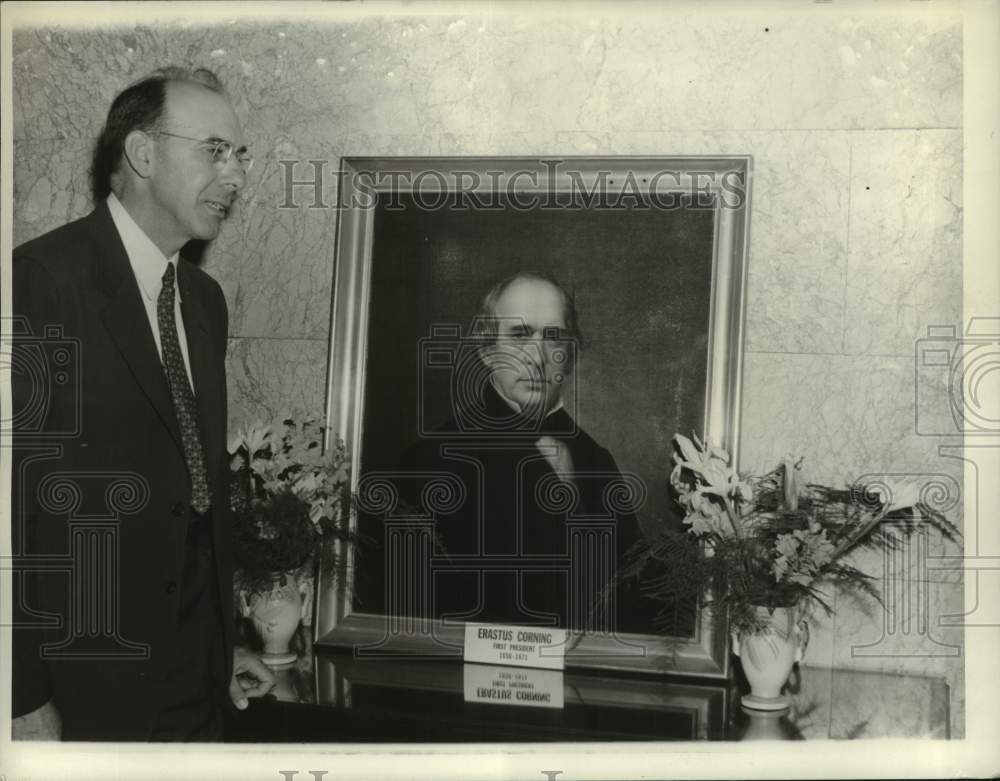 1941 Albany, New York banker with portrait of Erastus Corning - Historic Images