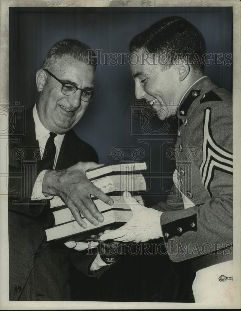 1964 Albany Academy headmaster passes books to graduate in New York - Historic Images