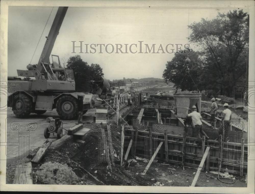 1973 Construction crew works on bridge over I-90 in New York - Historic Images