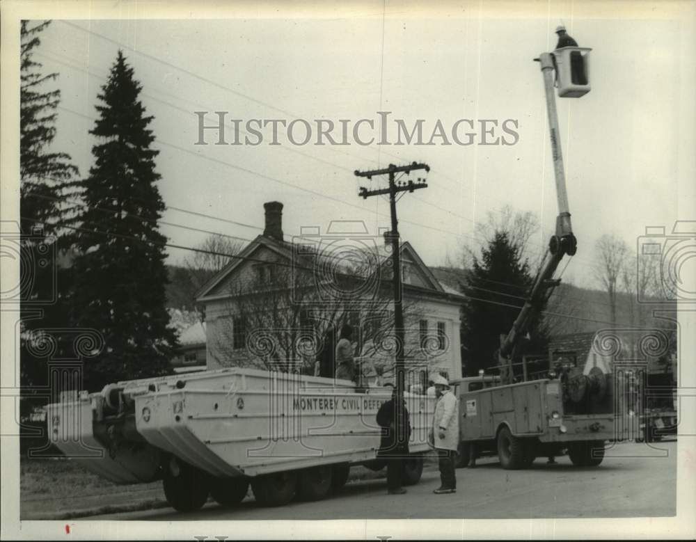 1968 Press Photo Crews work to restore power after flood in Lee, Massachusetts- Historic Images