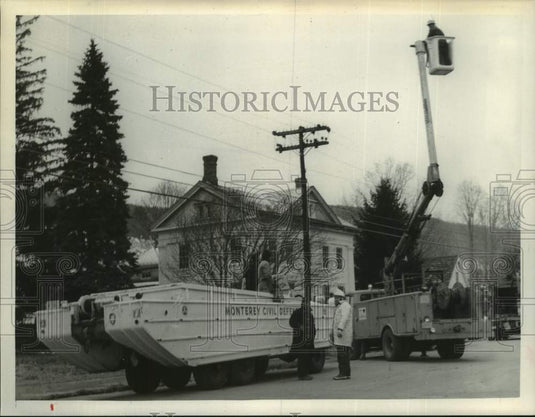 1968 Press Photo Crews work to restore power after flood in Lee, Massachusetts- Historic Images