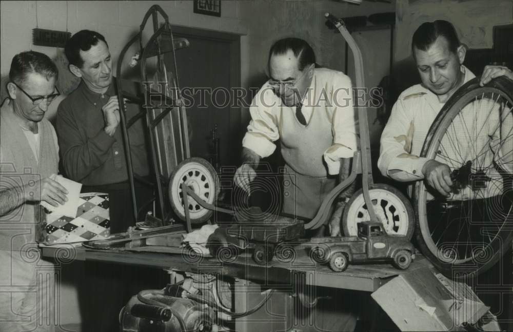 1958 Press Photo Kiwanis group inspects toys at Rensselaer, New York Boys Club - Historic Images