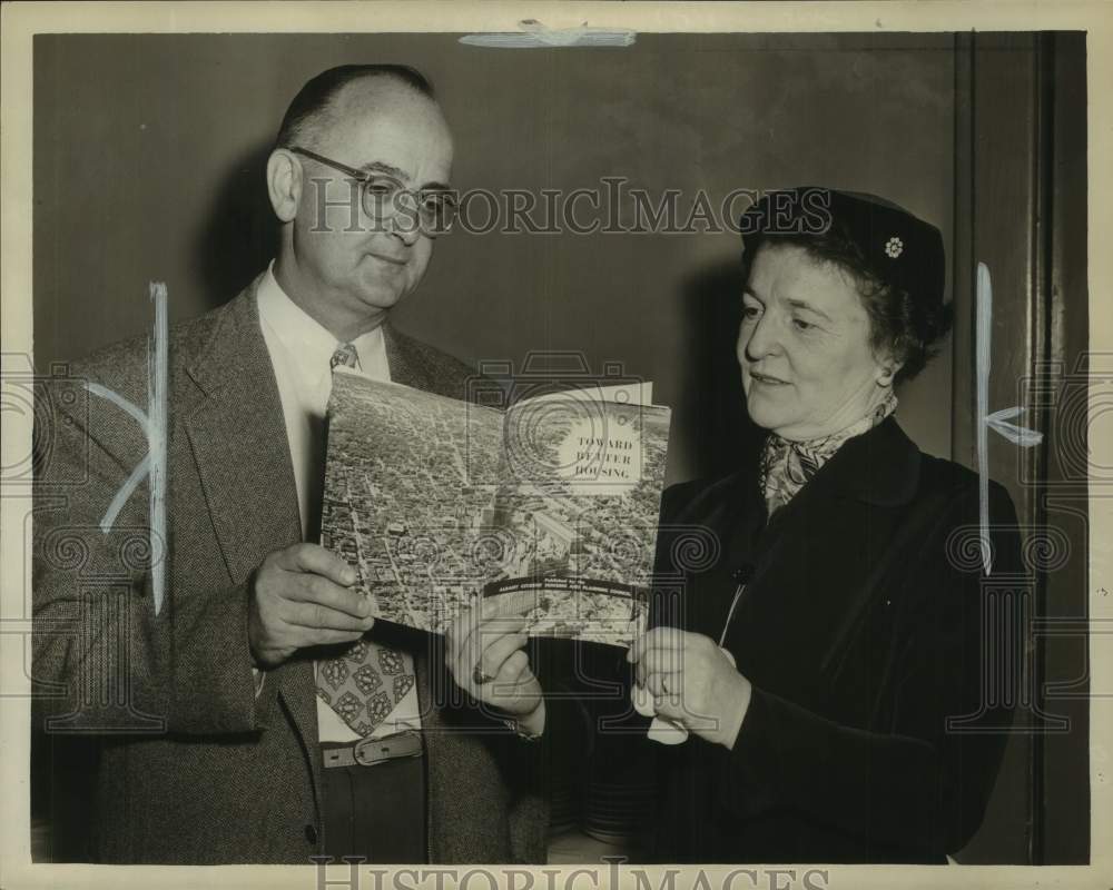 1954 Dr. J. Garth Johnson &amp; Mrs. Donald Davenport chat in Albany, NY - Historic Images