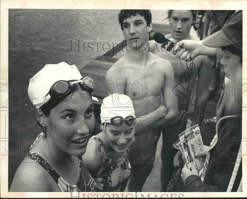 1978 Press Photo Swimmers interviewed on shore of Lake George, New York - Historic Images
