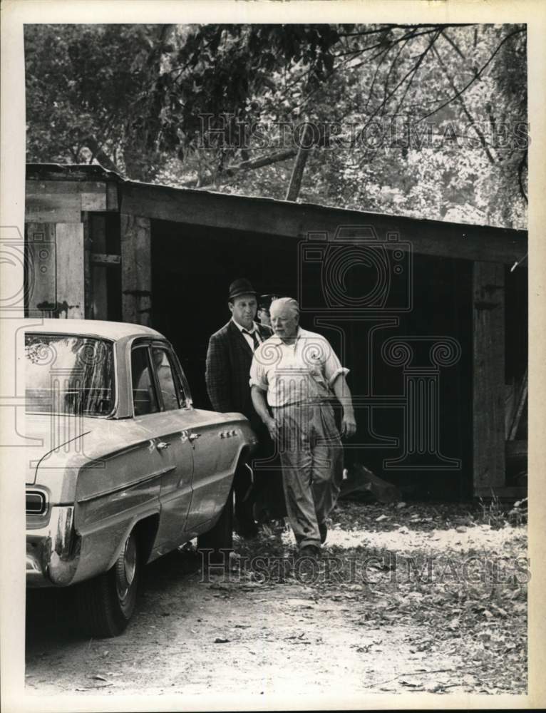 1964 Millard Brimmer escorted to car by police officers in New York-Historic Images