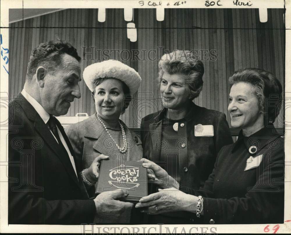 1969 Council of Jewish Women with cookbook in Colonie, New York-Historic Images