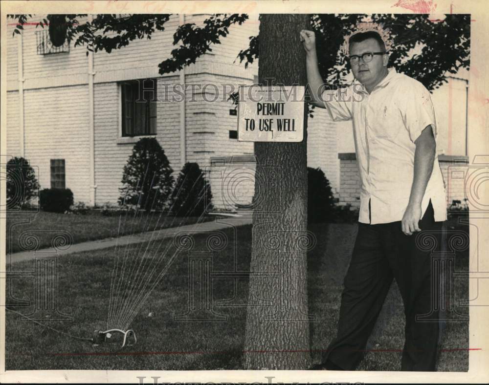 1965 Dr. Daniel F. Crowther watering his grass in New York-Historic Images