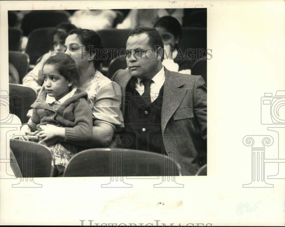 1985 Press Photo Couple holds granddaughter in their lap in Albany, New York - Historic Images