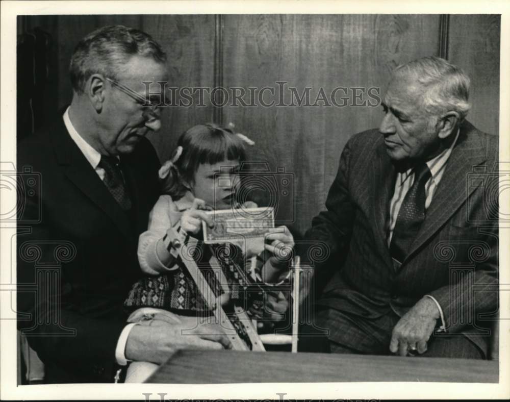 1972 Cerebral Palsy child with officials at telethon in New York - Historic Images