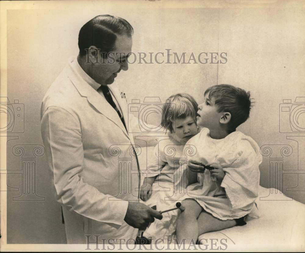 1968 Doctor examines children at St. Peter&#39;s Hospital, Albany, NY-Historic Images