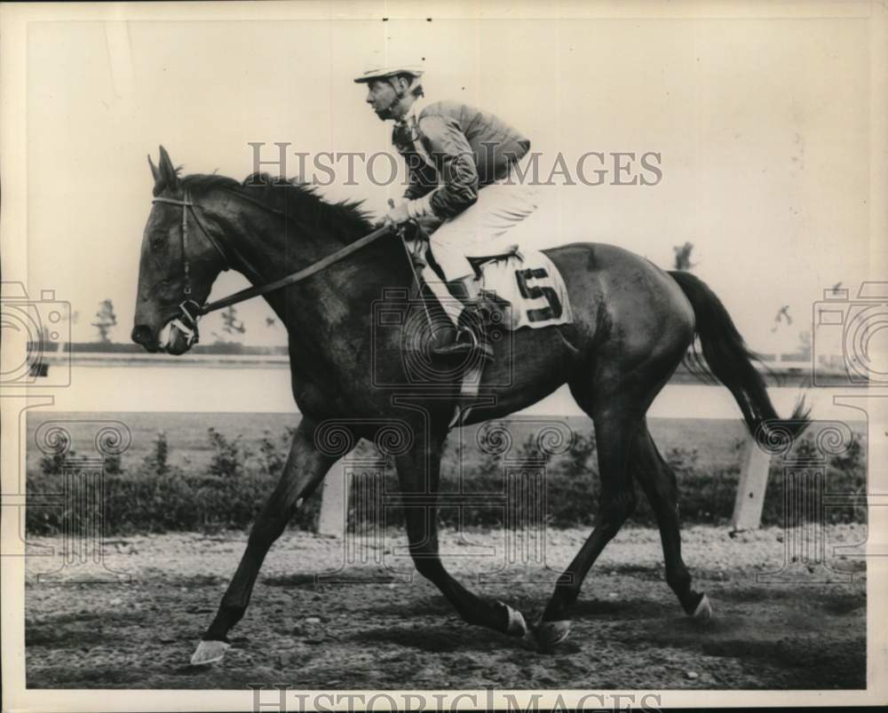 1959 Press Photo Jockey rides racehorse on track in New York - tua79271- Historic Images