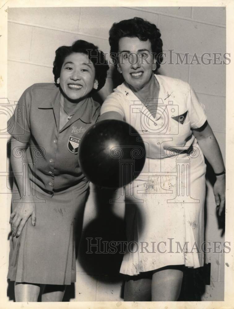 Press Photo Ladies pose with bowling ball in New York - tua80392 - Historic Images