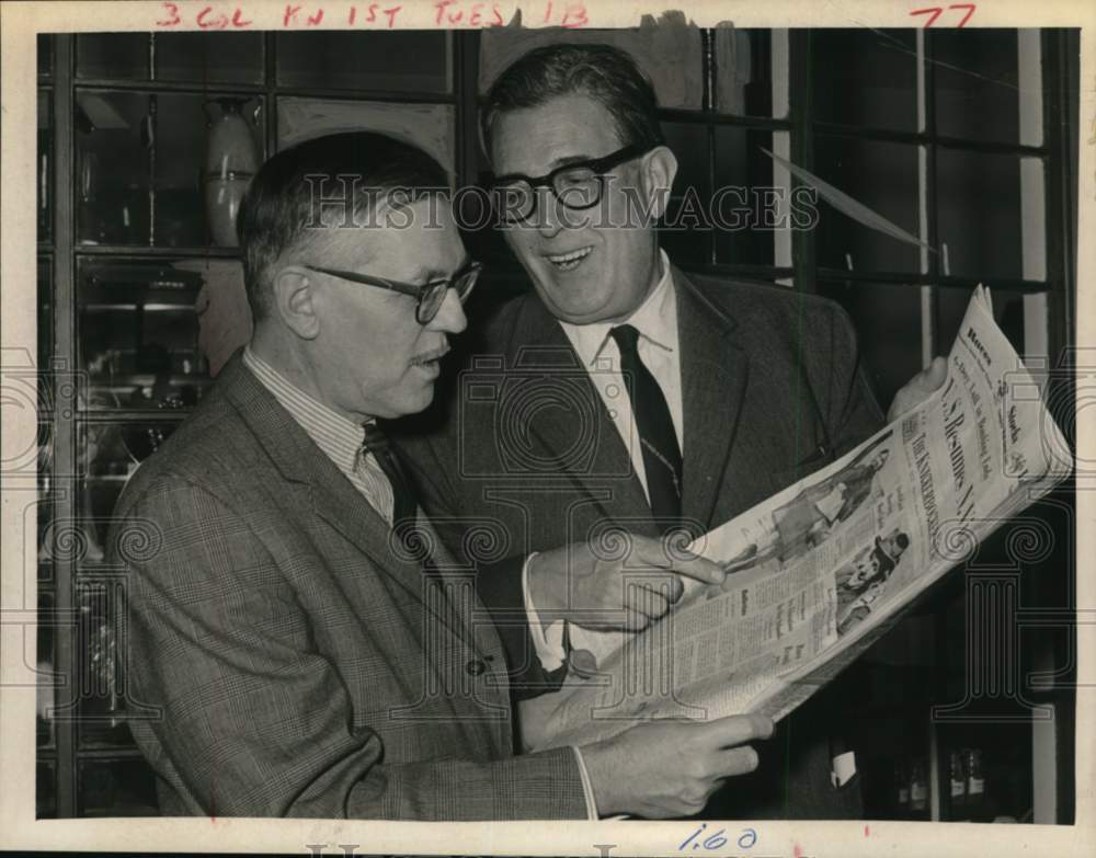 1967 J. Montgomery Curtis reads newspaper with colleague in New york-Historic Images