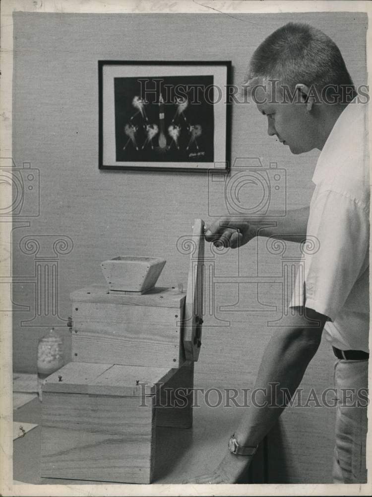 1963 Frederic Carlson with nut machine in New York-Historic Images