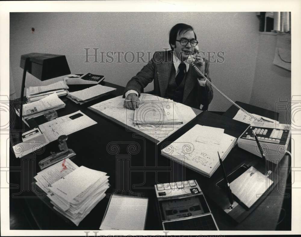 1978 Press Photo William Davis at desk in New York office - tua87472 - Historic Images