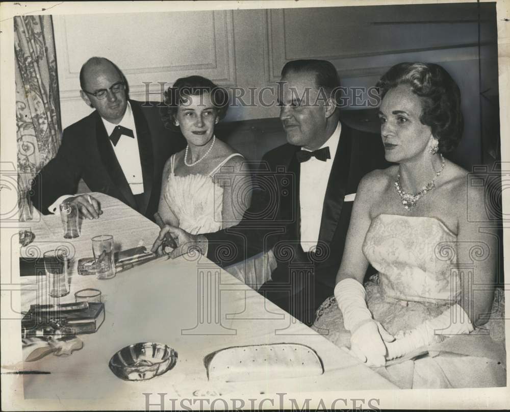 1960 Group chats around table at formal dance in Albany, New York-Historic Images