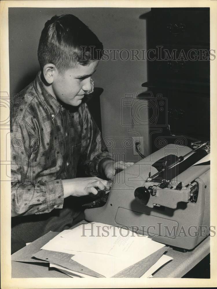 1961 Francis Casey using typewriter in New York-Historic Images