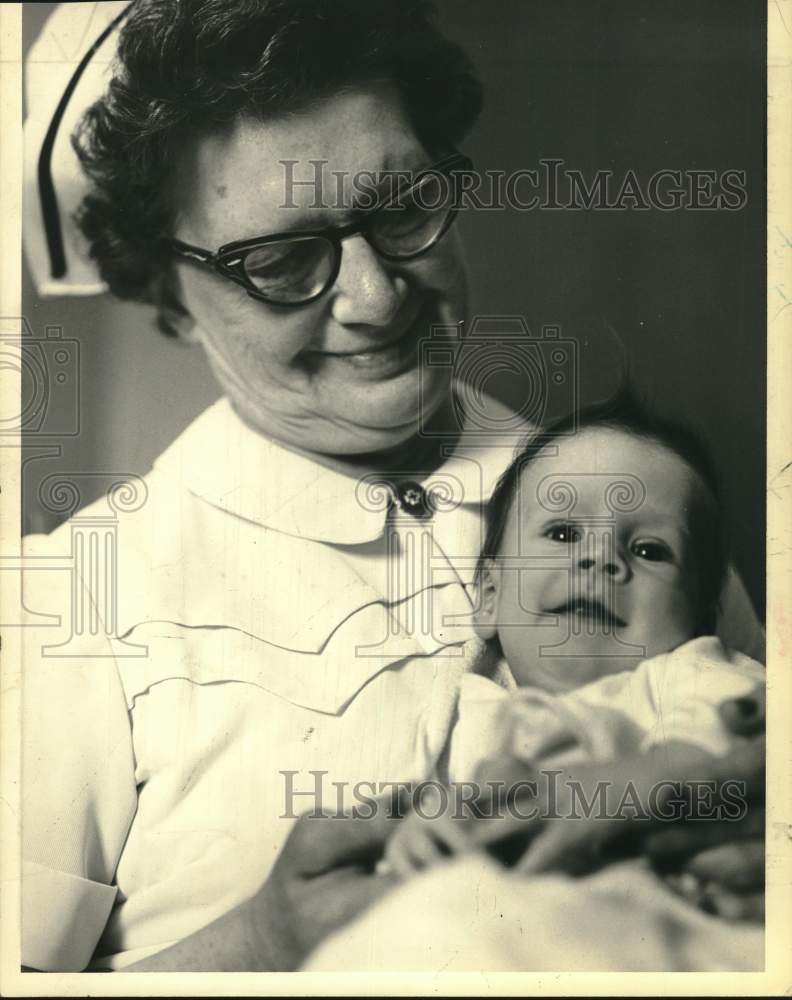 1967 Ora Chellis, RN, with Michael Jon Dunphy in New York-Historic Images