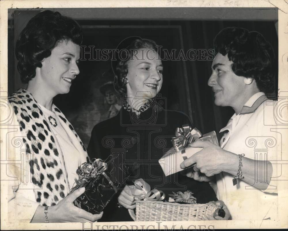 1963 Women exchange gifts at social event in Albany, New York-Historic Images