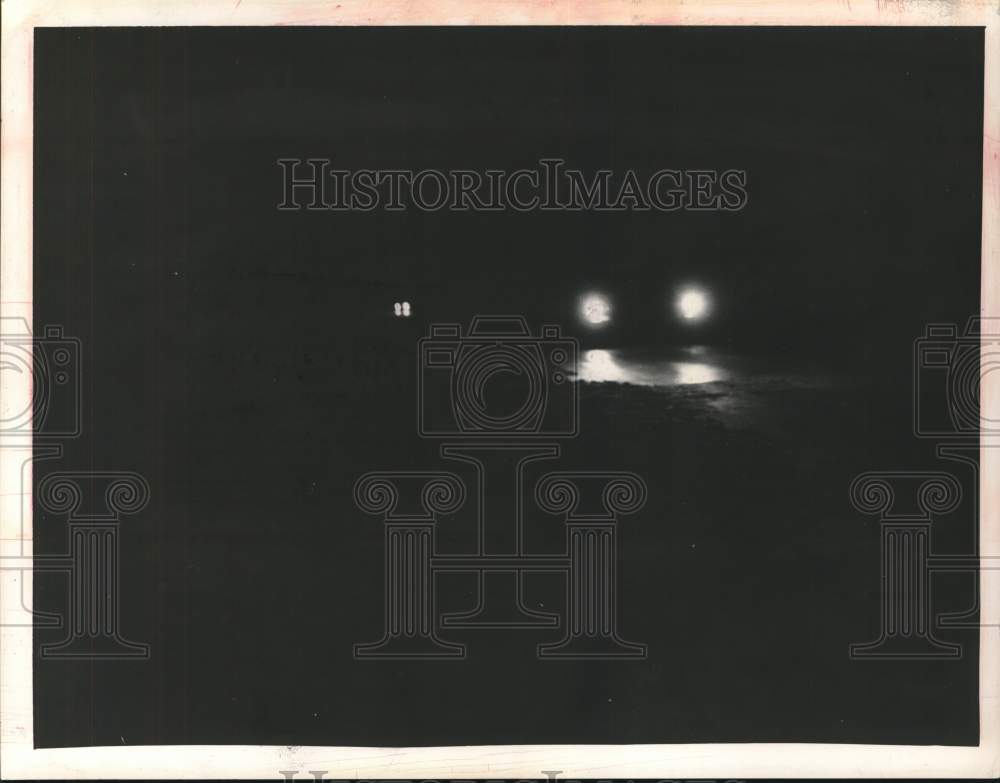 1964 Headlights of car on dark road near Delmar, New York-Historic Images