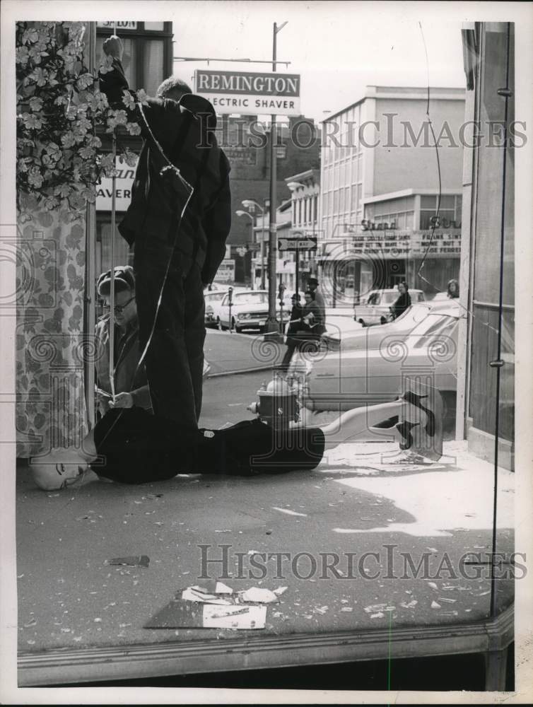 1965 Crew measures window at D&#39;Jimas Fur store in Albany, New York-Historic Images