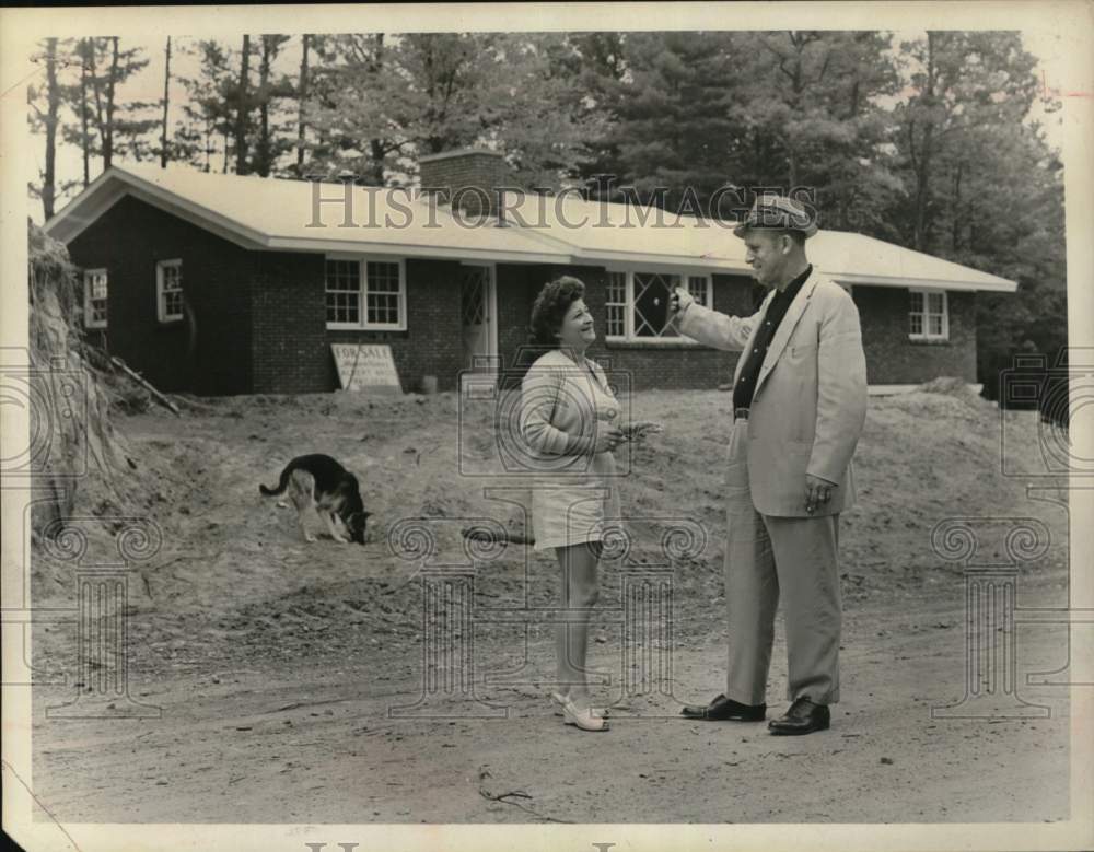 1961 Mr. & Mrs. Charles Elwertowski outside Westmere, New York home-Historic Images