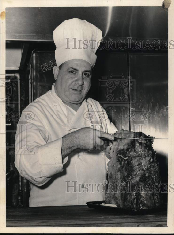 1961 Chef Philip Fazio cutting meat in New York-Historic Images