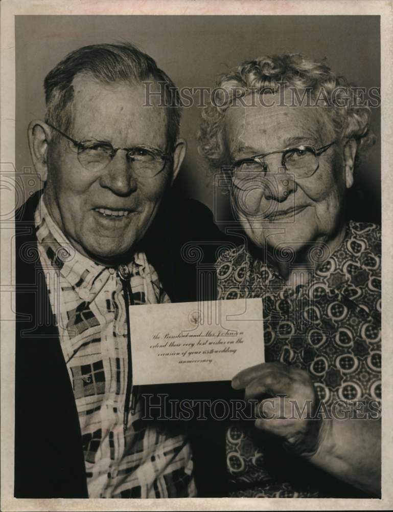 1965 Mr. & Mrs. Clinton Eastman with anniversary card from President-Historic Images