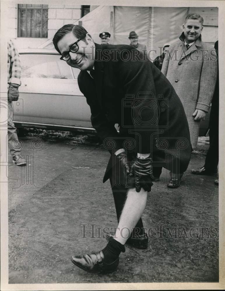 1969 Arthur Dinitz shows off uninjured leg after accident, New York-Historic Images