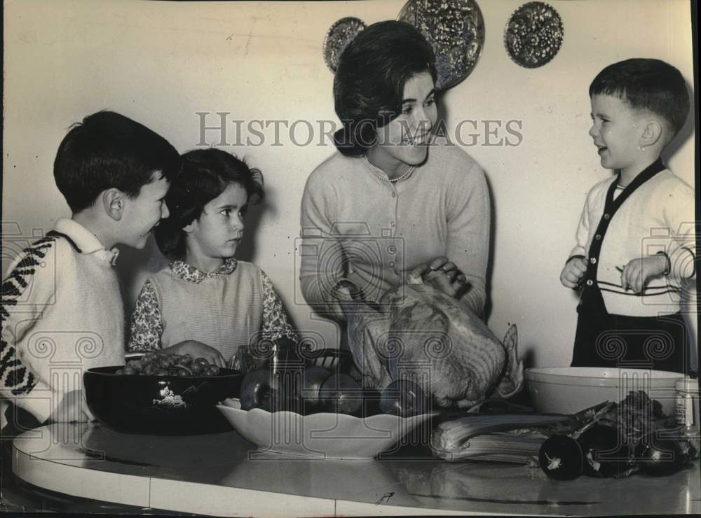 1963 Mrs. Matthew Fitzgerald with children at dinner table, New York-Historic Images