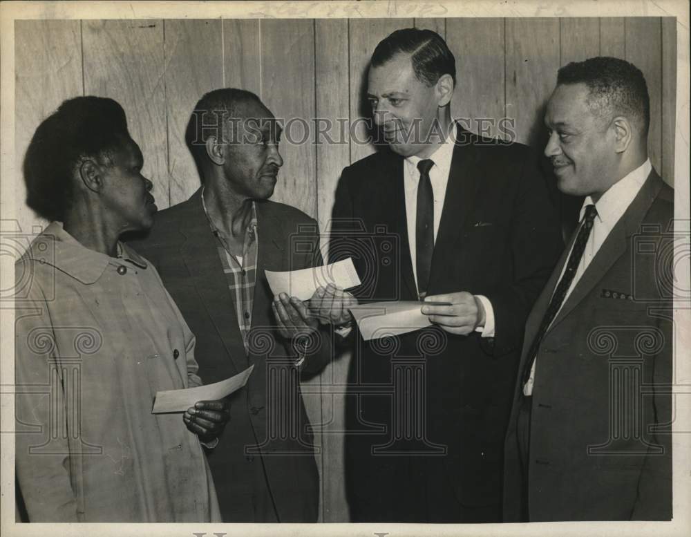 1967 Couple receives rent refund check in Albany, New York-Historic Images