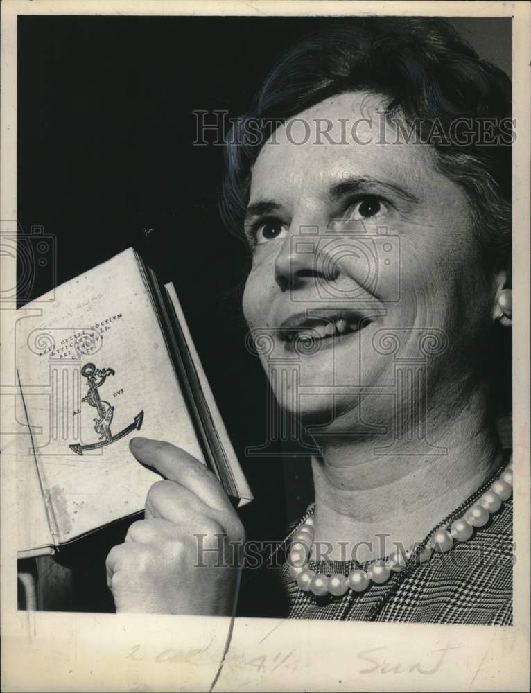 1964 Alice Hastings points out drawing in book in New York-Historic Images
