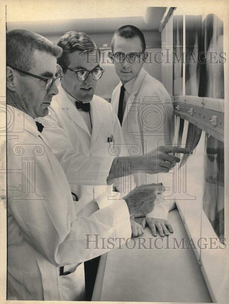 1967 Doctors study x-rays at Albany Medical College in New York-Historic Images