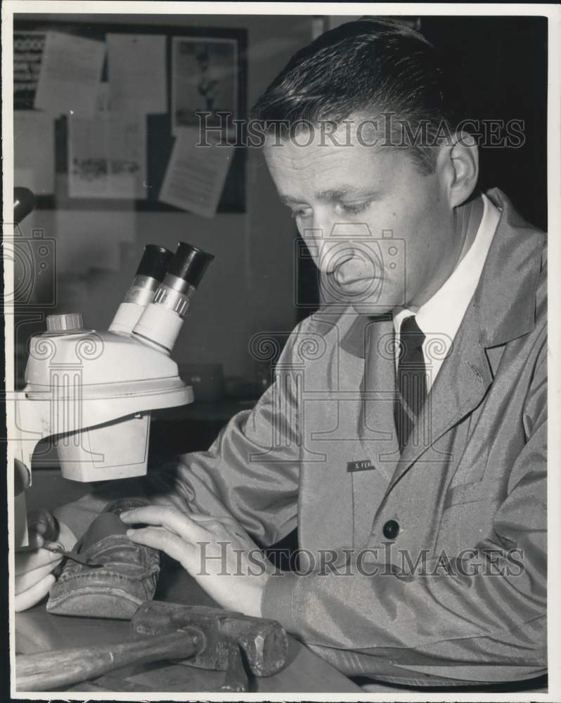1969 Stark Ferris, New York State Police criminologist, in crime lab-Historic Images