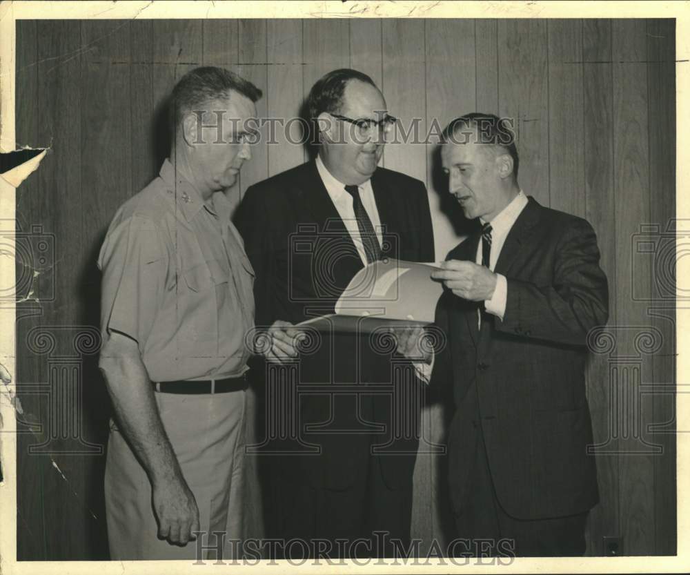 1964 Chester L. Fienberg confers with colleagues in New York-Historic Images