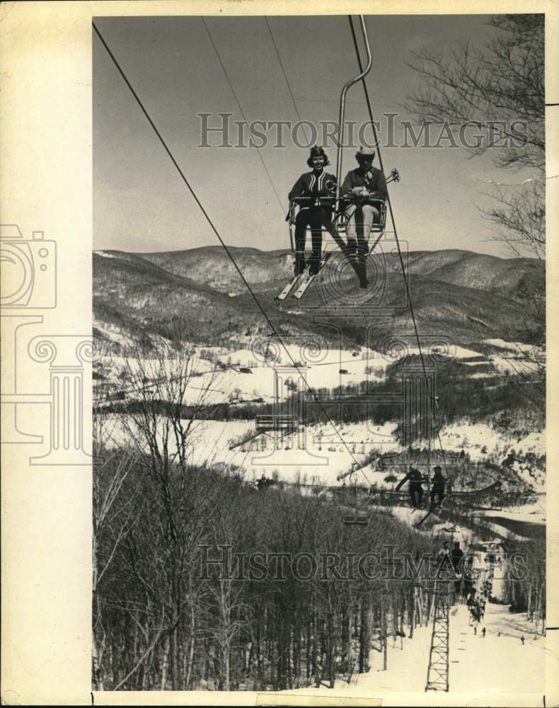 Press Photo Skiers ride the main chairlift at Jiminy Peak ski area - tub07301- Historic Images
